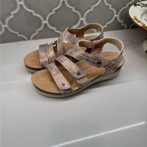 Women's rose gold metallic Clarks sandals